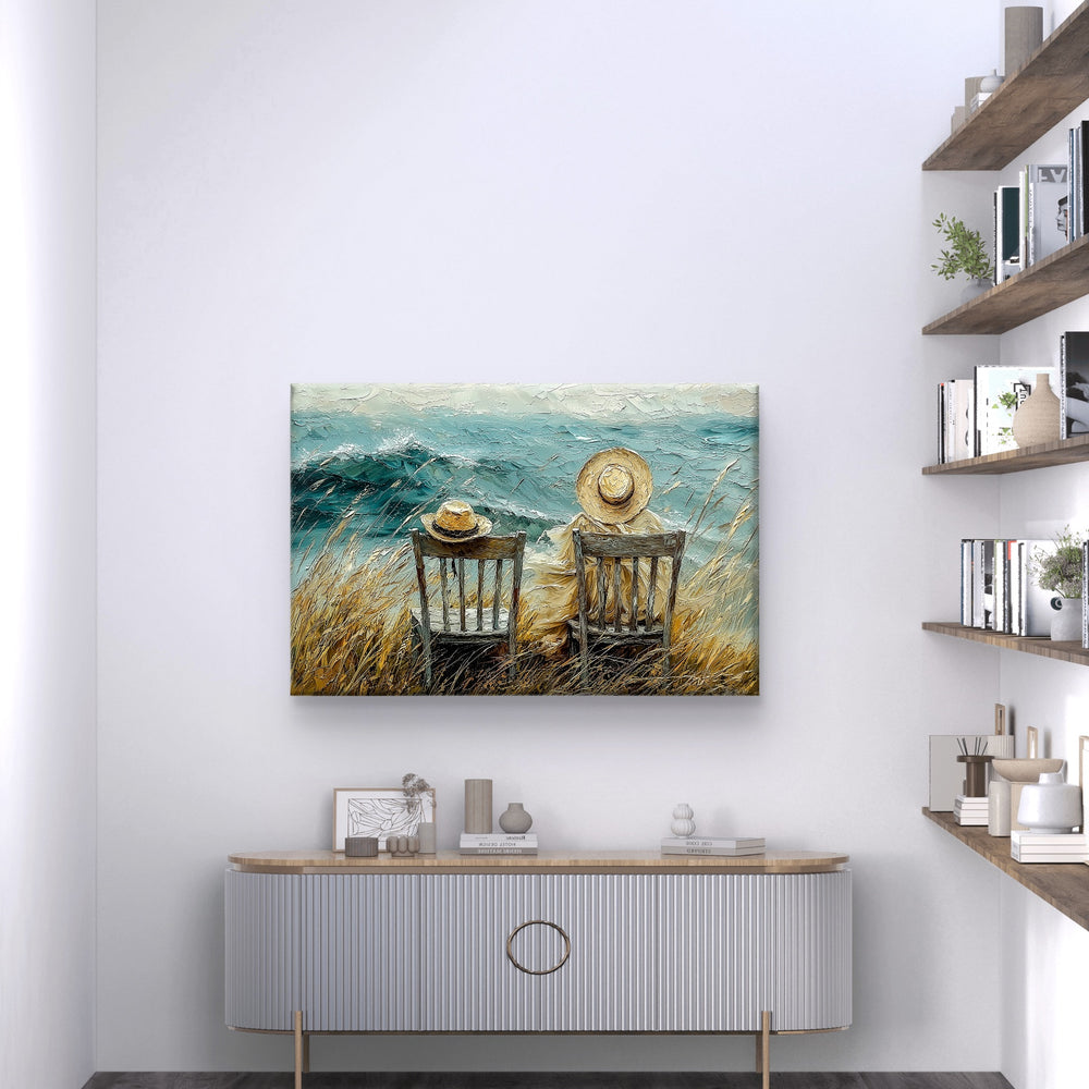 
                      
                        Kunst op canvas. Dit is een exclusief werk dat alleen maar verkrijgbaar is bij Pixure Art in Lanaken of in de webshop van Pixure Art. Het is ontworpen door Jan De Nil en er staat een woelige zee op afgebeeld met twee strandstoelen waarvan 1 stoel leeg is 
                      
                    